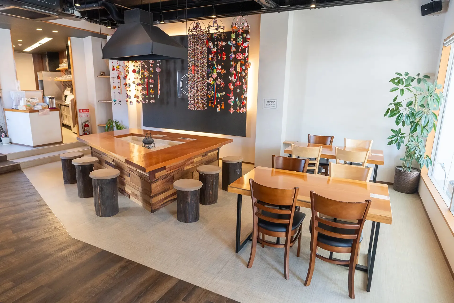 The RYOKAN O irori lounge and dining area